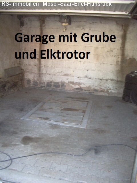 Garage mit Grube , Elektrotor 